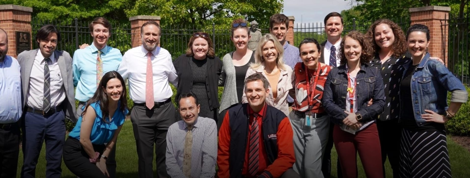 Faculty members pose for a photo
